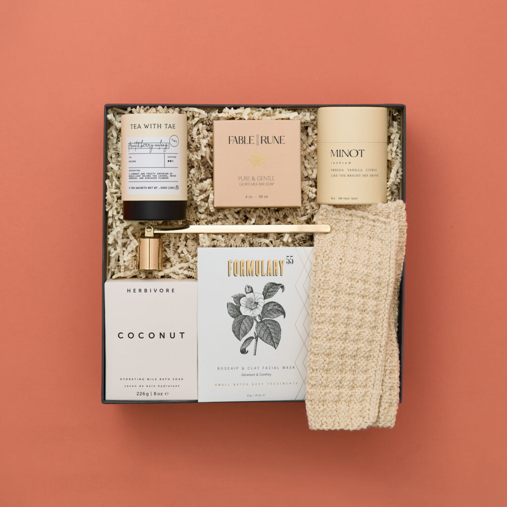 self-care gift box on a peach background