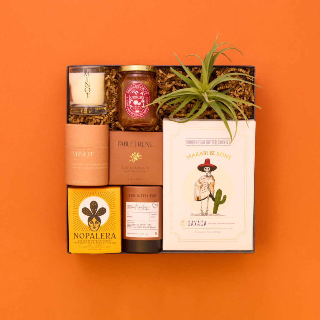 desert and coachella gift box on orange background